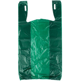 Πράσινες τσάντες αγορών παντοπωλείων χρώματος, πλαστικές τσάντες πουκάμισων γραμμάτων Τ φιλικές προς το περιβάλλον